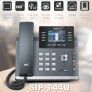 Yealink SIP-T4U office telephone with LCD screen and multiple feature icons displayed around it.