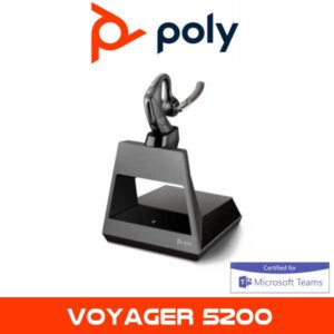 A Poly Voyager 5200 Bluetooth headset on its charging base with the Poly logo at the top and a "Certified for Microsoft Teams" badge at the bottom.