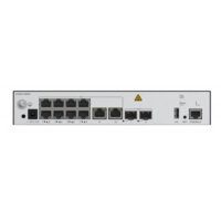 Rear view of a network switch showing various ports and warning labels.
