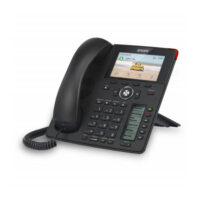 A black Snom D785 VoIP phone featuring a digital display, buttons for dialing, and a sleek design, resting on a stand with a coiled handset cord.