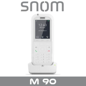 A sleek white Snom M90 wireless phone displayed on its charging dock, featuring a clear digital screen and an intuitive keypad.